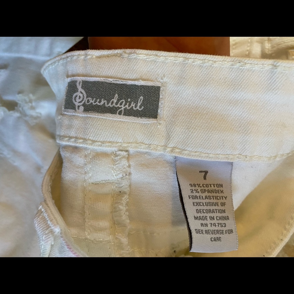 White skinny jeans, size 7